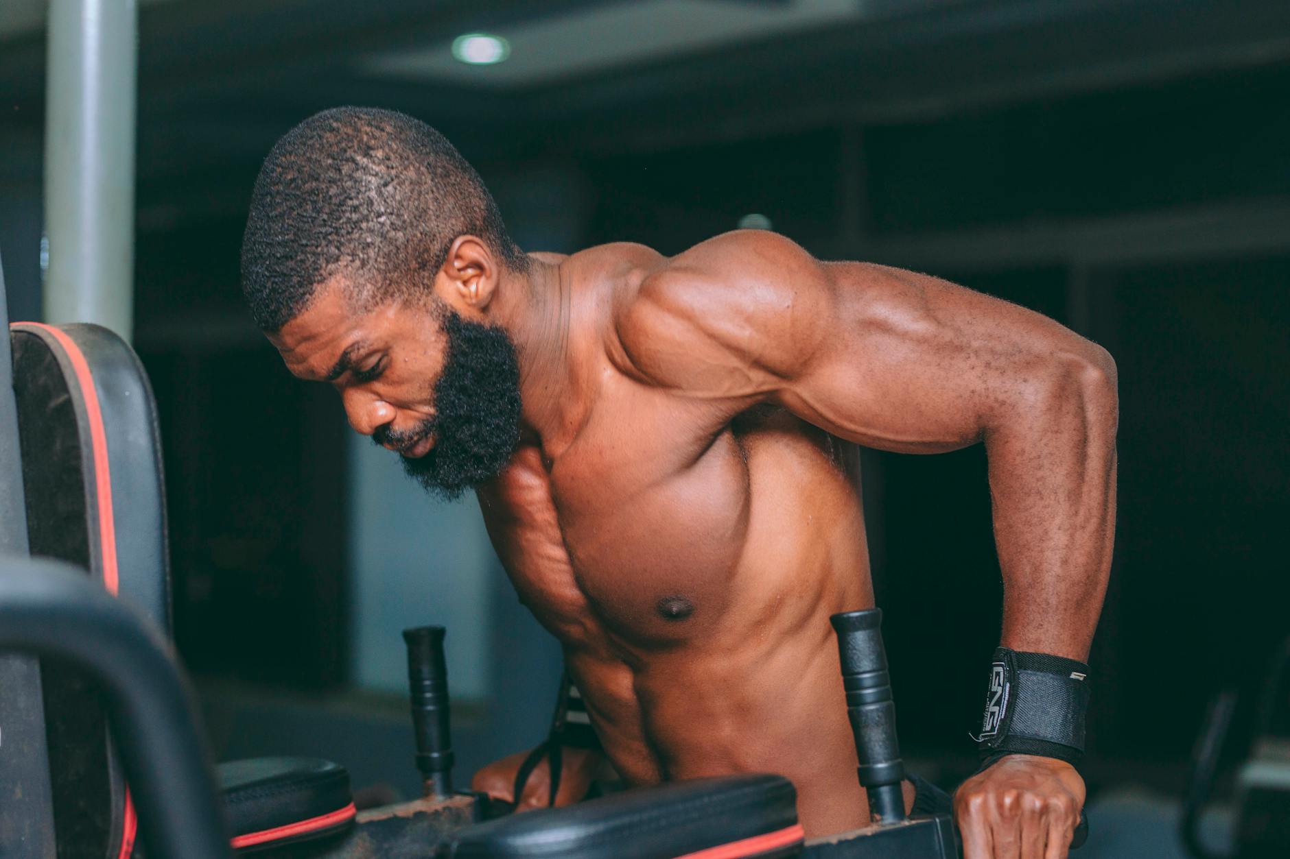 fit young man exercising at gym in accra