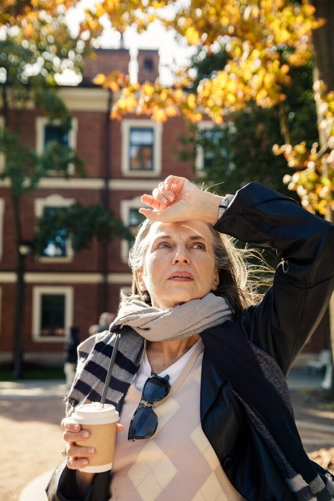 a person holding a cup